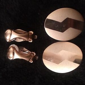 Two pair clip-on gold tone earrings